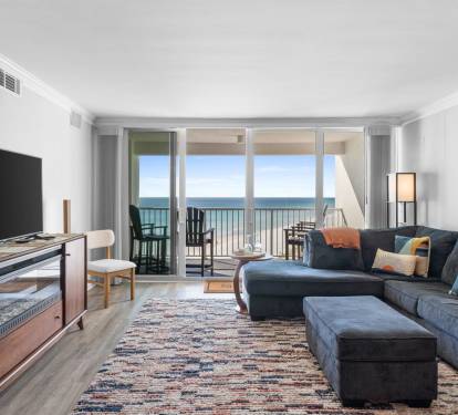 Sink into this plush sectional and let ocean waves fill your view through floor-to-ceiling windows.