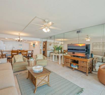 Relax in your spacious coastal retreat with ocean-inspired décor, comfortable seating, and an open layout perfect for gathering with loved ones.