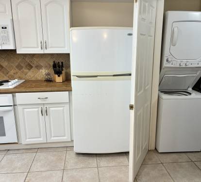 Your fully equipped kitchen features everything you need, plus convenient in-unit laundry to keep your stay comfortable and hassle-free.