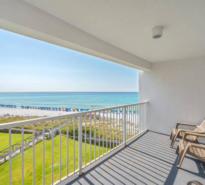 Step onto your private balcony and soak in breathtaking ocean views while relaxing in comfortable seating overlooking pristine beaches.