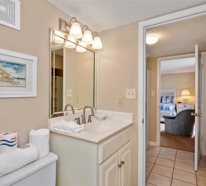 Your well-appointed bathroom features marble countertops, quality fixtures, and thoughtful lighting to start your mornings perfectly.