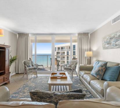 Sink into plush leather seating while ocean waves sparkle beyond your floor-to-ceiling windows, creating the perfect coastal retreat.