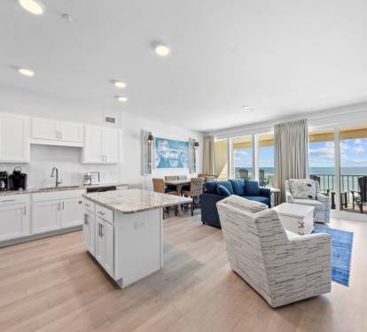Your stunning oceanfront retreat features an open-concept space where you'll cook, dine, and relax while soaking in breathtaking sea views through floor-to-ceiling windows.