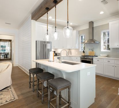 Your chef-worthy kitchen awaits with sleek countertops, modern appliances, and a perfect island for morning coffee or evening conversations.