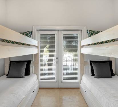 Rest easy in your cozy bunk room where comfort meets fun. Fresh linens and thoughtful touches create the perfect retreat after your adventures.