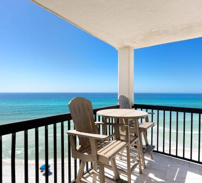 Sip your morning coffee on this private balcony while turquoise waves stretch endlessly before you.