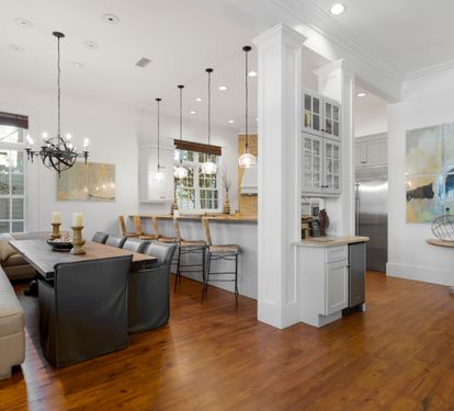Your open-concept living space flows seamlessly from cozy dining nook to gourmet kitchen, perfect for memorable meals together.