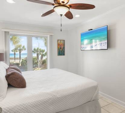 Wake up to stunning ocean views from your comfortable bed, with beach access just steps away through your private patio doors.