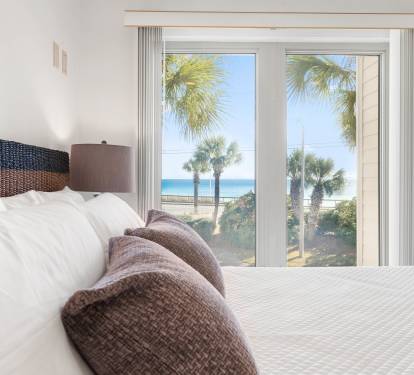 Wake up to stunning ocean views from your bed, with palm trees swaying just outside your window and pristine beach moments away.