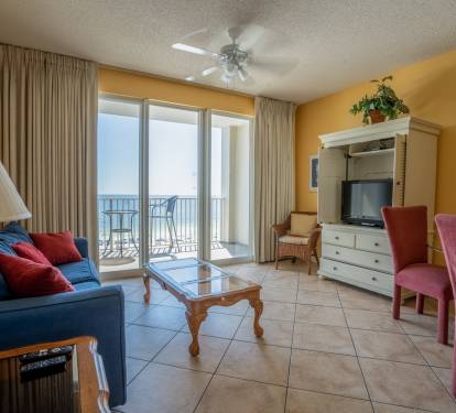 Living Room to Balcony with Beach Views.
