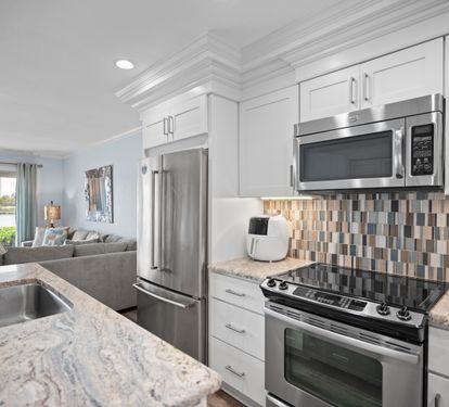 Open layout connects to a cozy, stylish living area.