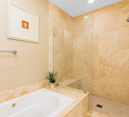 Wharf 713 Primary Bathroom with Soaking Tub and Separate Shower