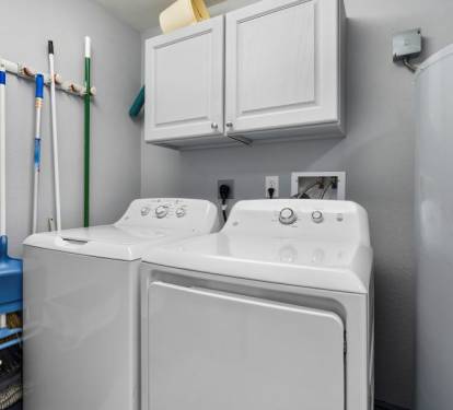 Crystal Tower 709 Laundry Room with Full Size Washer Dryer