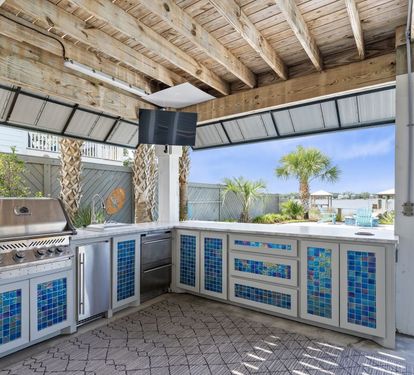His & Hers Outdoor Kitchen with Television