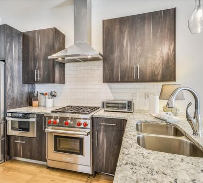 Kitchen - Equipped with a Wolf Gas Range