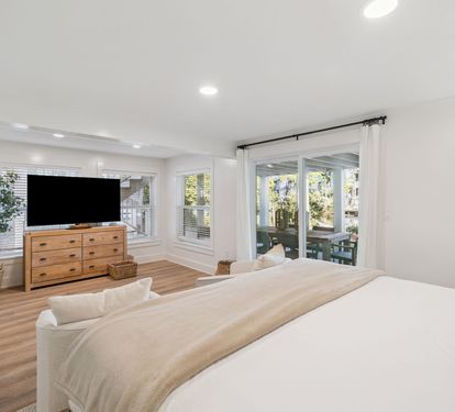 Primary King Suite - Flat-Screen TV + Patio Access