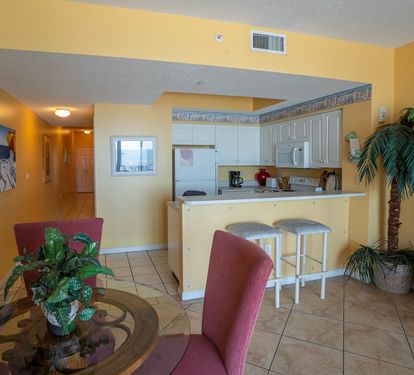 Living room with a dining table and chairs.