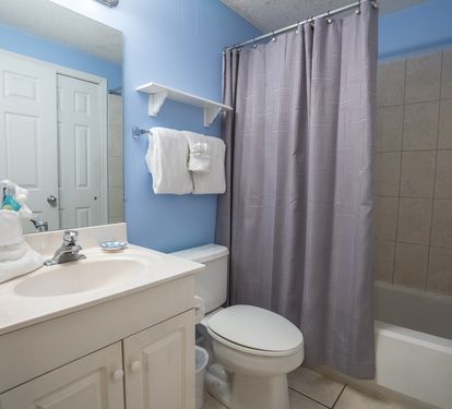 Primary bathroom with tub/shower combination.
