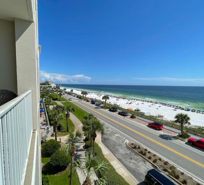 A view of the beach looking east from the balcony of the condo.