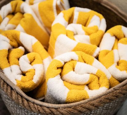 Fresh beach towels are provided and ready to grab on the way out to the pool.