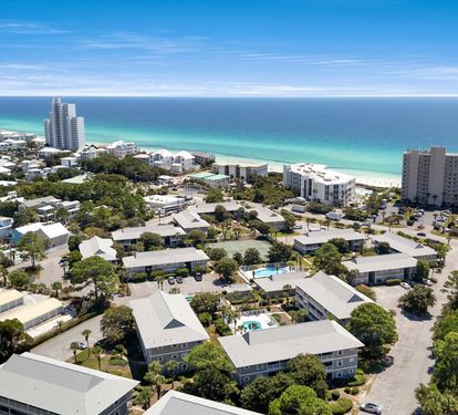 Coastal community with pristine beaches and turquoise waters.