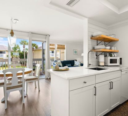 Your bright, open kitchen flows seamlessly into the dining and living areas, creating the perfect space for memorable meals together.