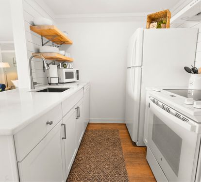 Your bright galley kitchen features modern appliances and everything you need to prepare meals during your stay.