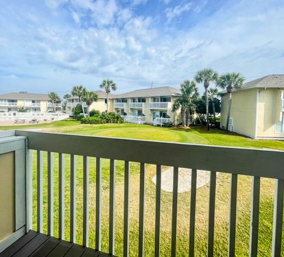 Step onto your private balcony and soak in peaceful views of manicured grounds and palm-dotted courtyards.