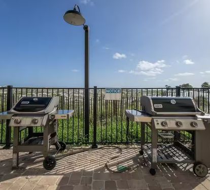 Beachfront grilling area with Gulf views—cook out just steps from the sand and enjoy outdoor dining by the water.