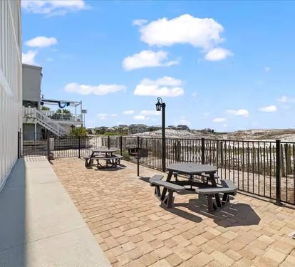 Beachside picnic and grilling area with Gulf views—perfect for outdoor meals and relaxing by the shore.