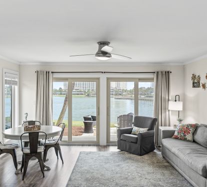 Relax in your bright living space with stunning waterfront views right outside your door.