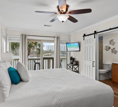 Wake up to stunning coastal views from your comfortable bed, then freshen up in your private ensuite with modern barn door styling.