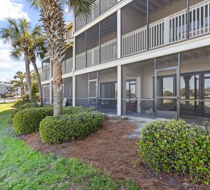Ground-floor location with a private screened patio and easy access to the scenic lake and resort grounds.