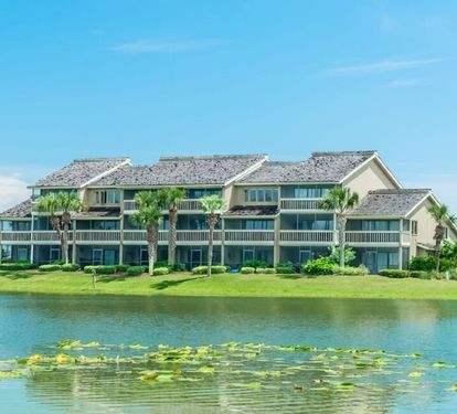Peaceful lakeside setting with scenic golf course surroundings and relaxing coastal charm.