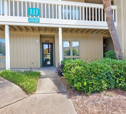 Convenient first-floor entry with easy access to parking, resort amenities, and the beach nearby.
