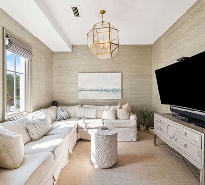 Family Room with Ample Seating & Large Flat-Screen TV