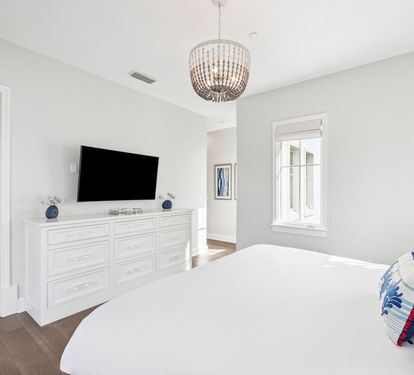 Front Primary King Suite - Equipped with a Flat-Screen TV