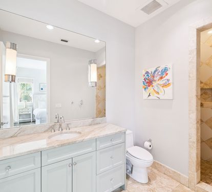 Front Primary King En-Suite - Single Vanity + Walk-In Shower