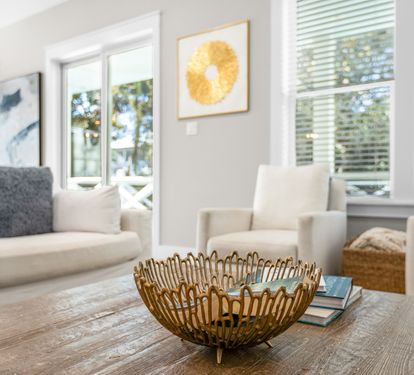 Unwind in your bright, airy living space where natural light streams through large windows, creating the perfect retreat for relaxation.