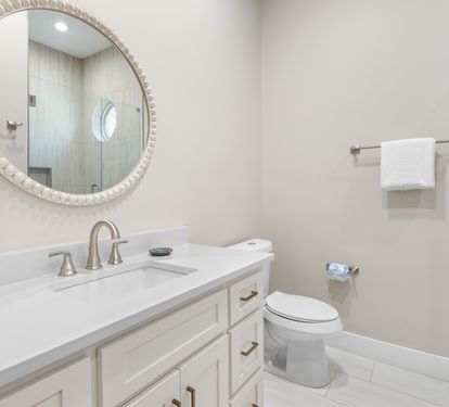 Step into your serene bathroom oasis with marble counters, elegant fixtures, and a luxurious walk-in shower waiting for your arrival.
