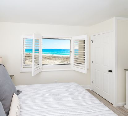Enjoy the amazing view from the king bed in the master bedroom
