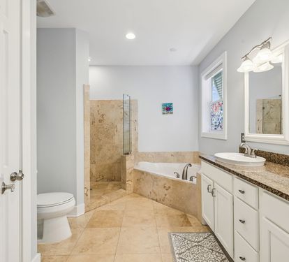 Primary King En-Suite - Oversized Soaking Tub + Walk-In Shower