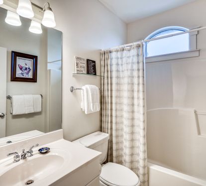 Queen Guest En Suite - Featuring a Shower/Tub Combo & Single Vanity
