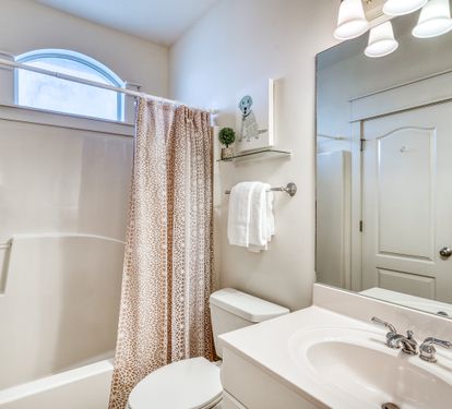 Shared Bathroom - Featuring a Shower/Tub Combo & Single Vanity
