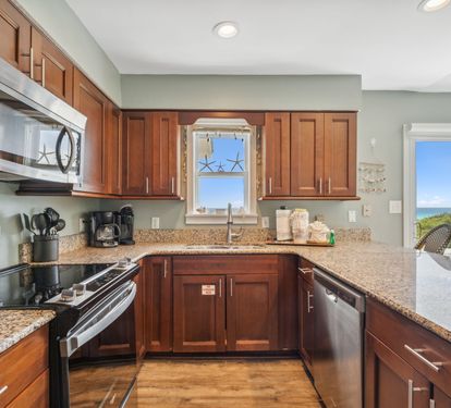 Kitchen - Equipped with Stainless Steel Appliances