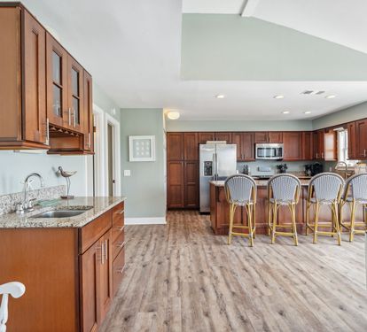 Wet Bar and Bar Stools at Kitchen Island