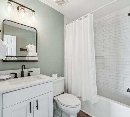 Shared Guest Bathroom - Equipped with a Shower/Tub Combo