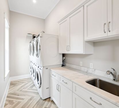3 Washers & Dryers in the Laundry Room!