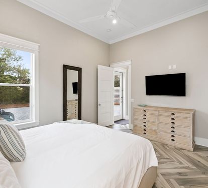 Primary King Suite - Equipped with a Flat-Screen TV
