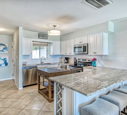 Updated Kitchen with Extra Bar Seating